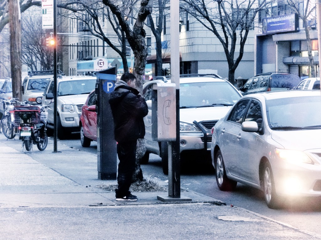Payphone User. Woodside, Queens, NYC. March, 2016.