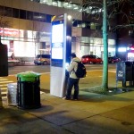 LinkNYC User. Third Avenue. April, 2016.