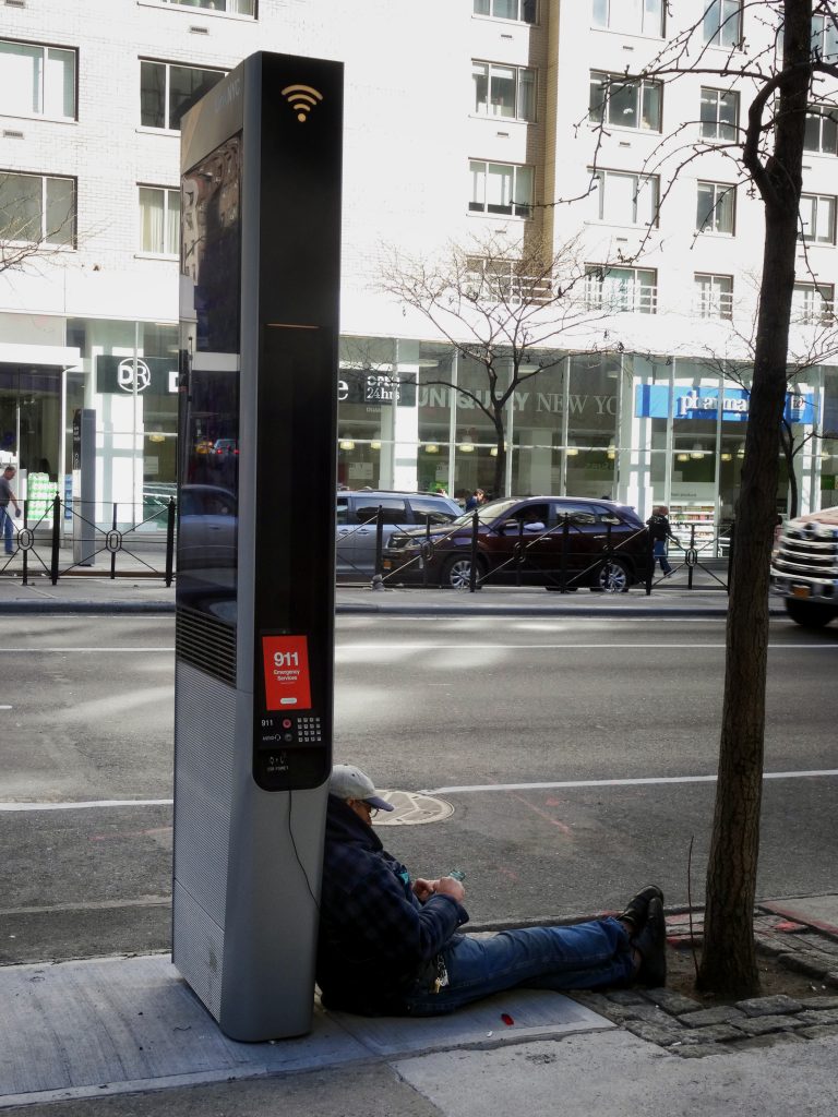Lounging on a Link. Third Avenue and 57th Street.