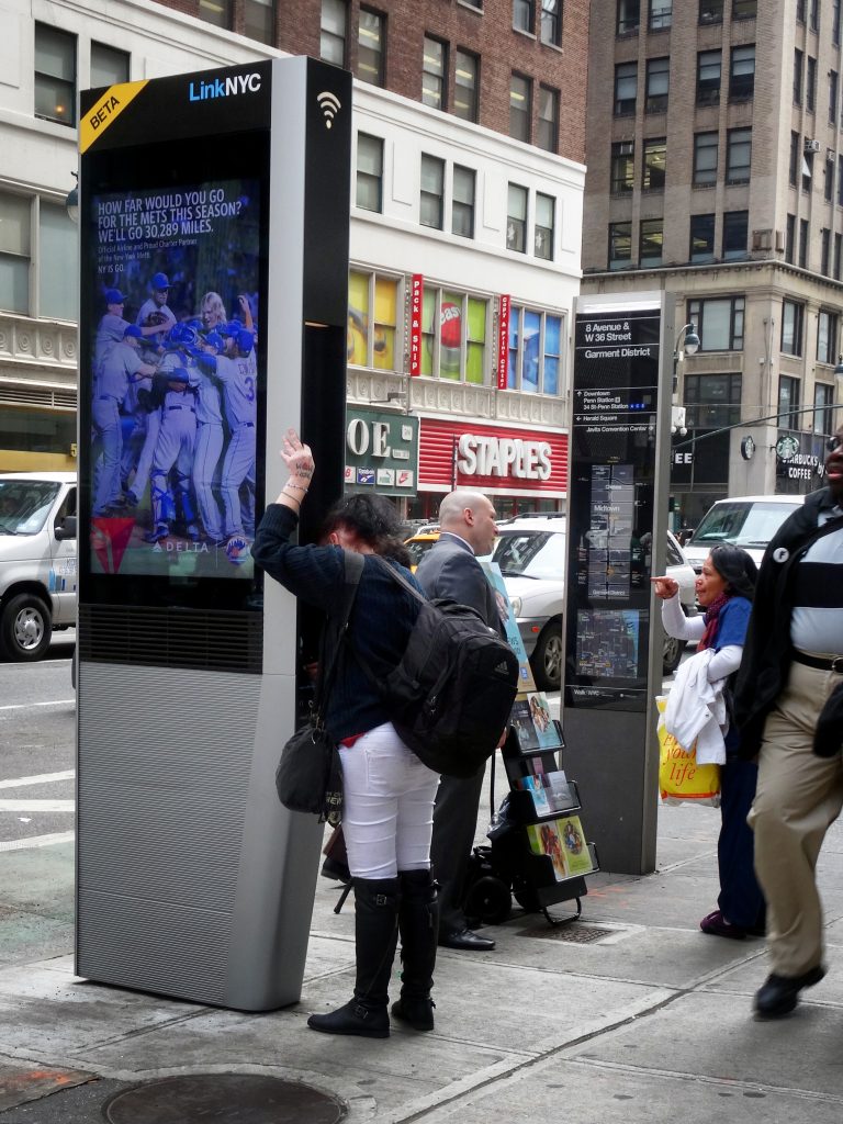 Talking on the Link. 8th Avenue.
