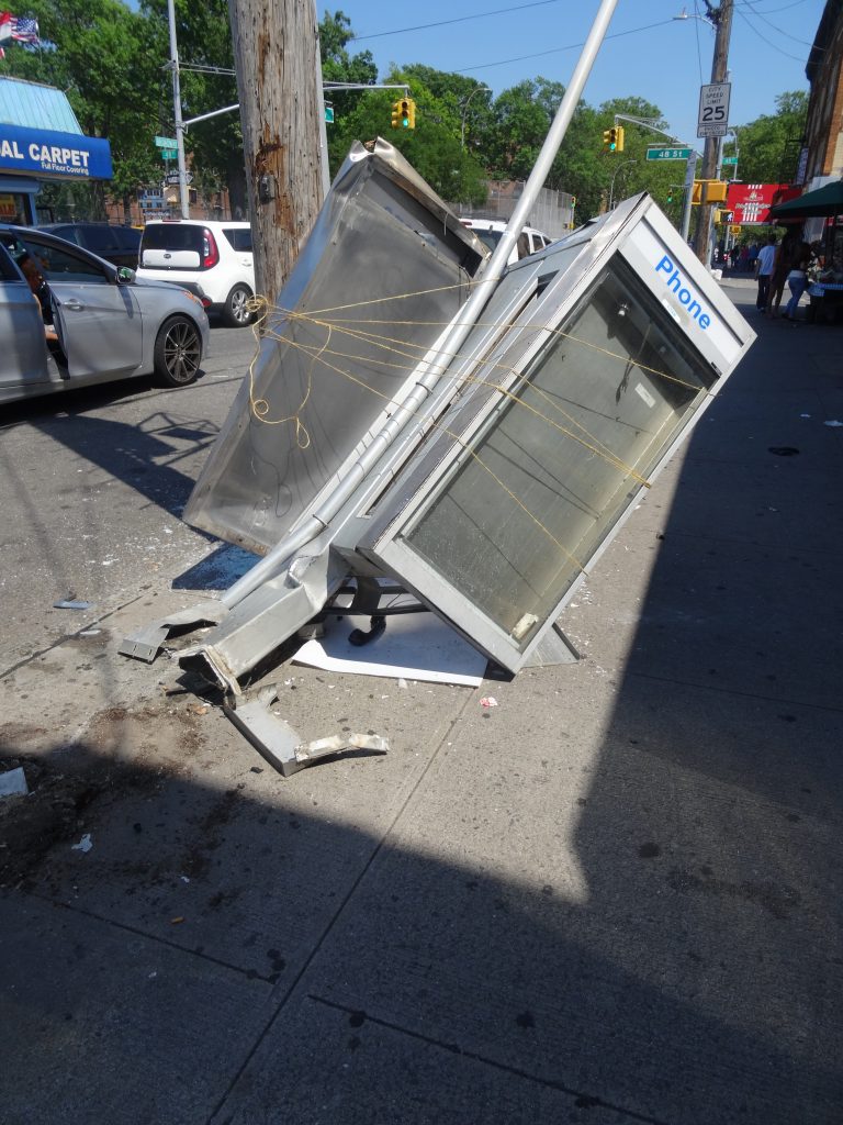 Payphone Down: Broadway in Astoria.